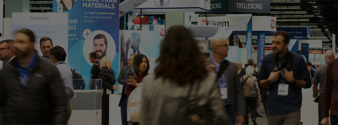 Attendees and exhibitors walking the expo hall