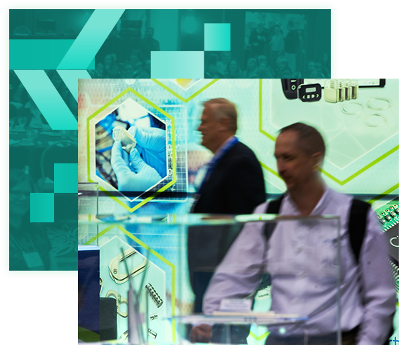 Two Expo hall visitors examining products