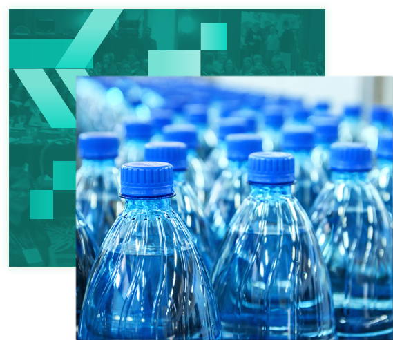 Plastic blue bottles in conveyor belt