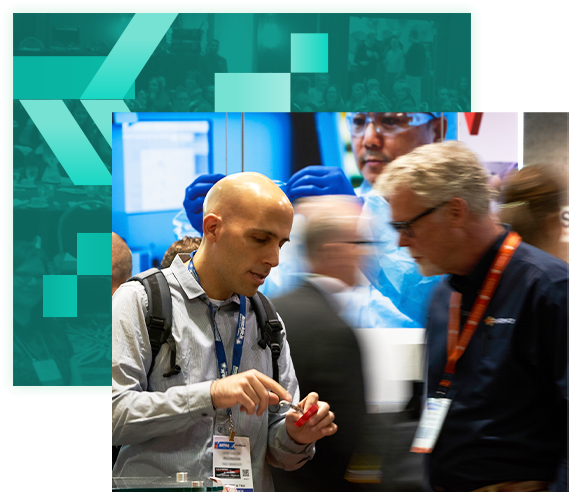 Two attendees examining a product in the expo hall floor